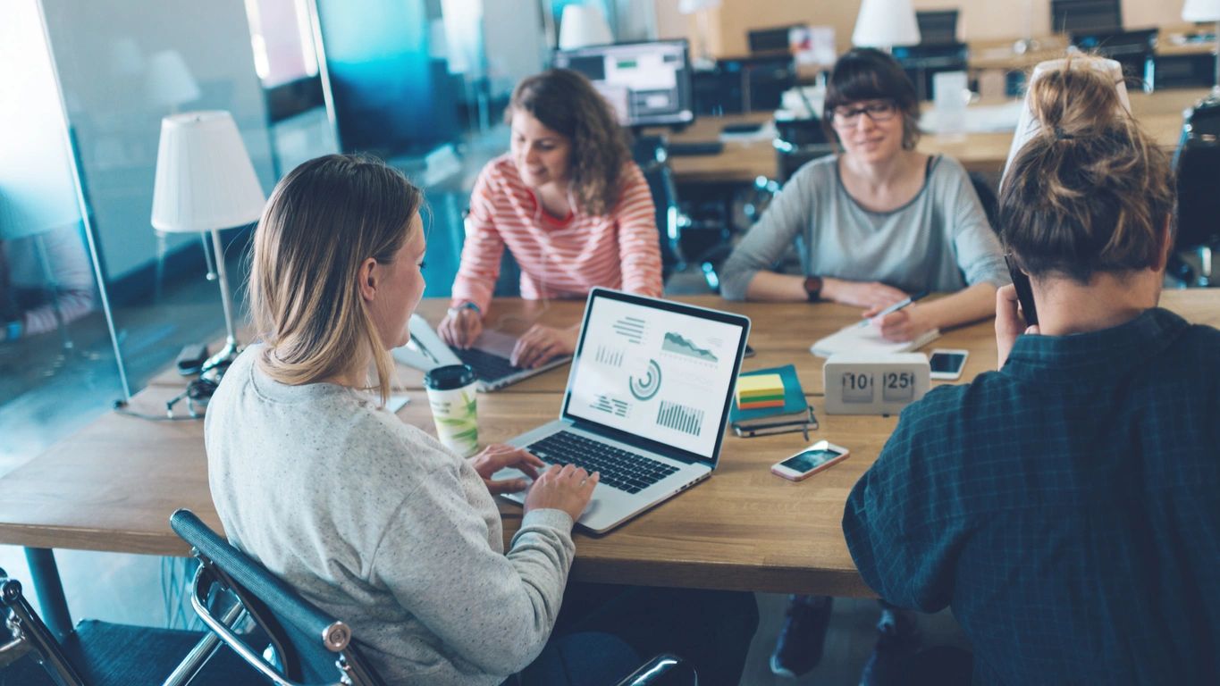 Meeting room concept. Strategy business discussion in cozy open space office. Four people